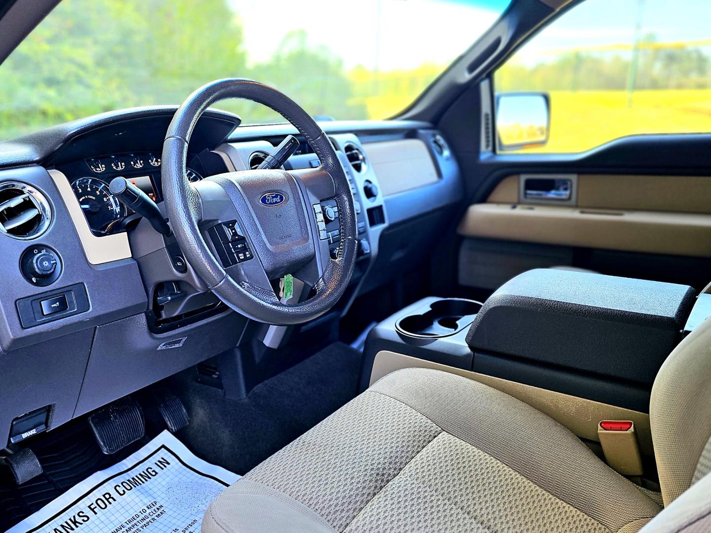 2011 White Ford F-150 LXT SuperCrew 5.5-ft. Bed 2WD (1FTEW1CM3BF) with an 3.7L V6 DOHC 24V engine, 4-Speed Automatic transmission, located at 18001 Kellogg Rd, Saucier, MS, 39574, (228) 832-1441, 39.421459, -76.641457 - Photo#9